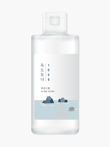 Round Lab 1025 Dokdo Toner in branded clear bottle with clear cap on light gray background